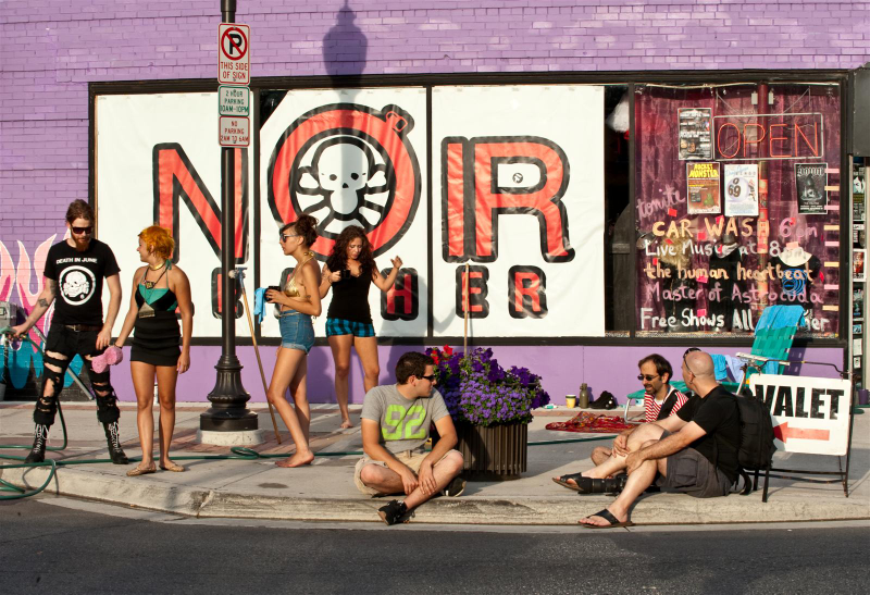 Illustration for article titled Noir Leather Bikini Car Wash Meetup Pictures